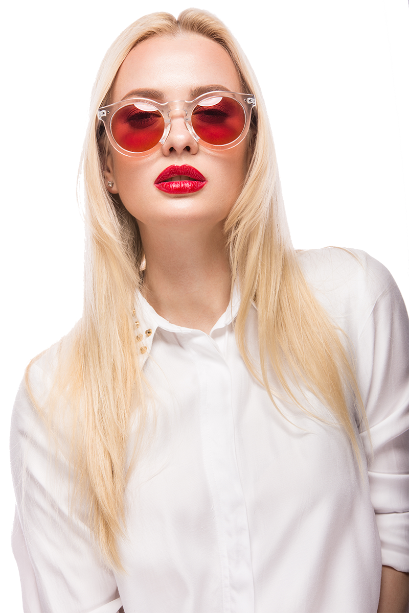Woman posing during a photoshoot for an advertising campaign